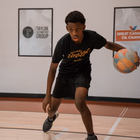 Kid practicing dribbling